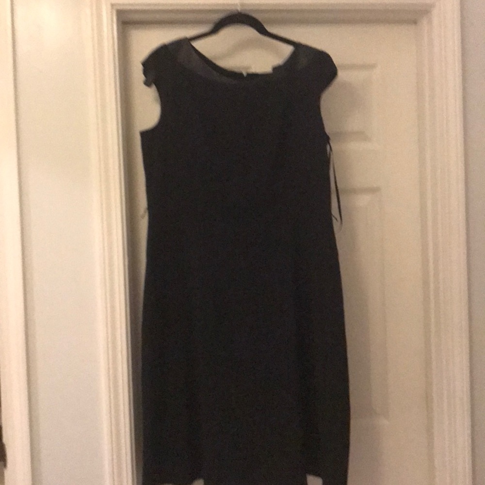 Black dress with drop waist and leather detail